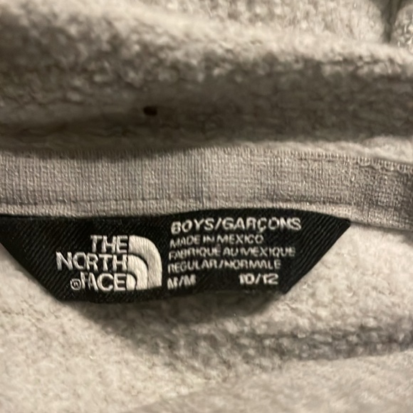 A grey kids never stop exploring sweatshirt. Size 10-12. - Picture 3 of 5